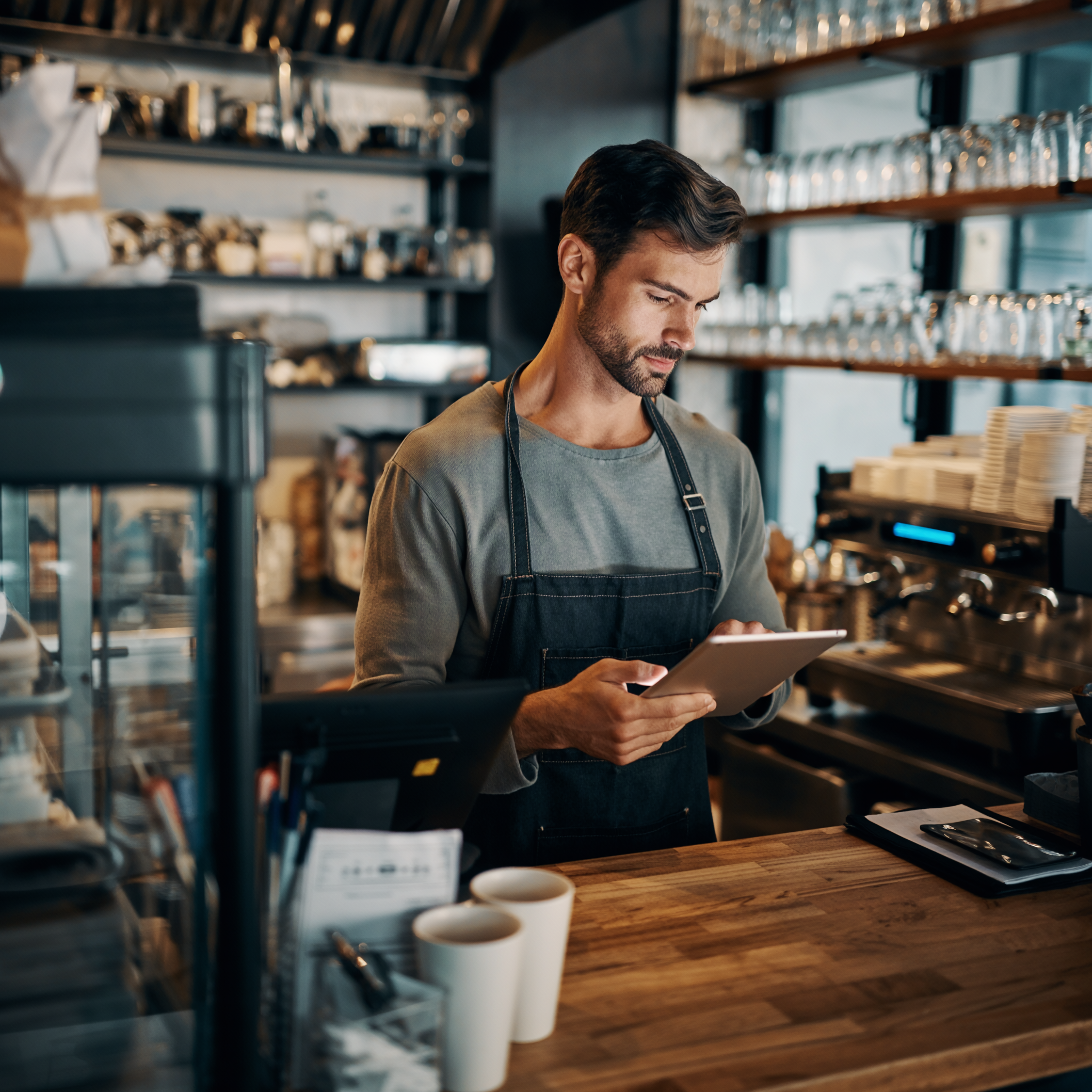 Restaurant owner with tablet